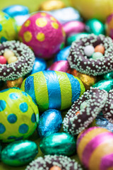 Fototapeta na wymiar Close up of colorful easter eggs and sweets