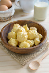 Choux pastry cream puffs with milk
