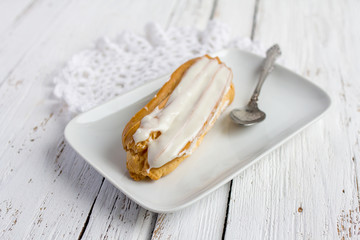 Dessert Eclair with whipped cream