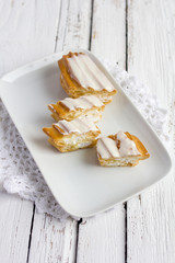 Dessert Eclair with whipped cream