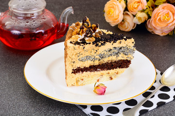 Sweets: Delicious fresh piece of cake with nuts.