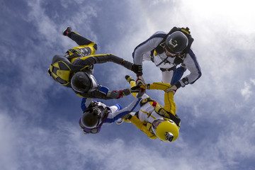 Fototapeta na wymiar Group of skydivers in free style.