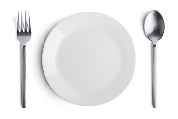 white plate with silver fork and spoon