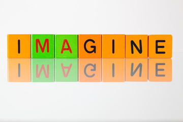 Imagine - an inscription from children's blocks
