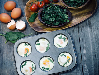 Fototapeta na wymiar preparing egg muffins