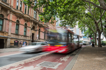 Fototapeta premium Blurred red bus in sydney