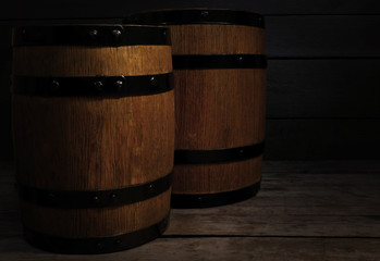 Fototapeta premium Two old wooden wine barrels, closeup