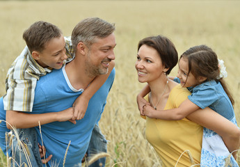 happy family at   field