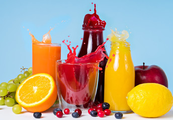 colorful fresh many juices splash with fruits