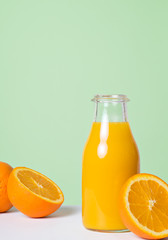 colorful fresh orange juice in bottle