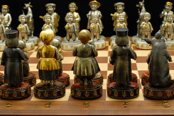 Fototapeta na wymiar Exclusive national chess made of silver, gold and precious stones.