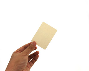 Fototapeta premium hand holding blank business card in hand. Isolated on white