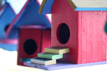 Obraz na płótnie Canvas close up of colorful wooden bird house