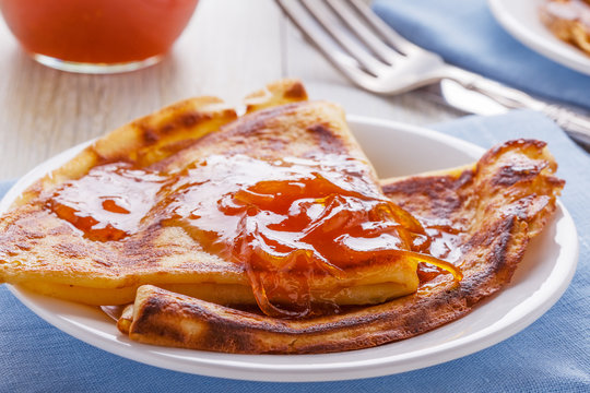 Homemade french crepes with orange syrup.