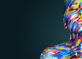 Bright beautiful girl with art colorful make-up and bodyart