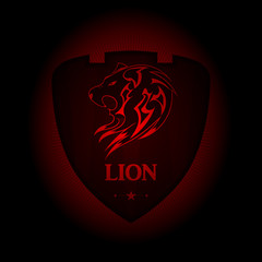 lion logo. the emblem appearing out of the darkness. Perfect on your black shirt! vector