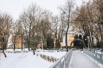 Bridge leading to the Peter and Paul Cathedral in city park in G