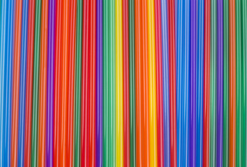 texture of colored cocktail sticks. colored vertical stripes.