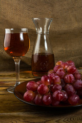 red grapes on dark wooden background