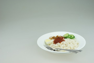 Nasi Lemak or Malay fragrant rice, cooked in coconut milk and pandan leaf