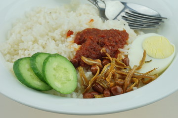Nasi Lemak or Malay fragrant rice, cooked in coconut milk and pandan leaf
