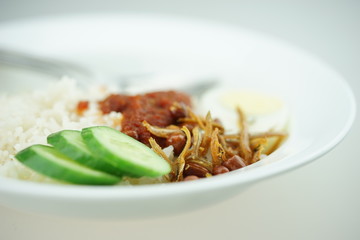Nasi Lemak or Malay fragrant rice, cooked in coconut milk and pandan leaf