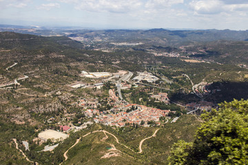 Fototapeta na wymiar Wide view from the beautiful mountains of Montserrat where a famous benedictine abbey is located near Barcelona city, Spain.
