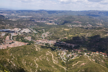 Fototapeta na wymiar Wide view from the beautiful mountains of Montserrat where a famous benedictine abbey is located near Barcelona city, Spain.