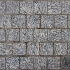 Dark gray mosaic tile stone.Material construction.