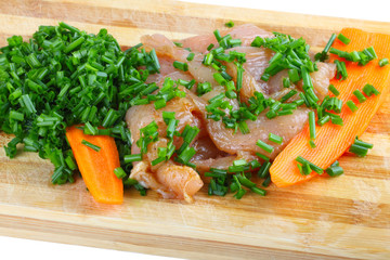 chicken breasts on cutting board