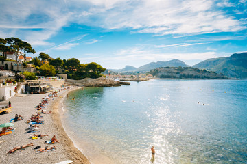 Obraz premium People resting at beach in Cassis, France.