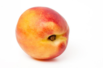 Tasty nectarine fruit isolated on white background.