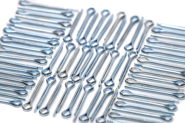 Many wire clips aligned on a creative style.