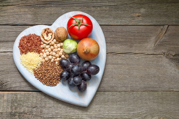 Healthy lifestyle concept with food on heart
