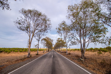 Long asphalt road on the beautiful countryside.