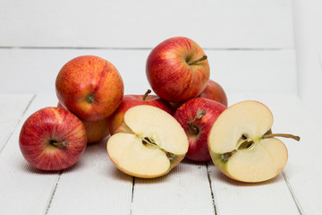 Naklejka na ściany i meble Fresh tasty red apple fruits isolated on a white background.