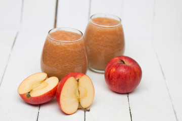 Fresh apple juice isolated on a white background.