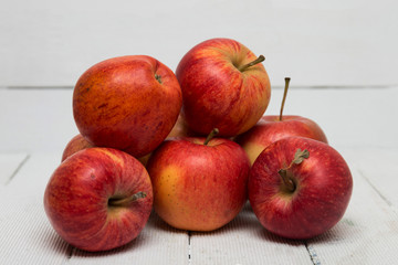 Fresh tasty red apple fruits isolated on a white background.