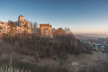 Fototapeta premium Ruins of medieval castle Teczyn in Rudno, Poland, in the evening, vintage photo