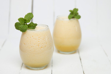 Fresh pineapple juice isolated on a white background.