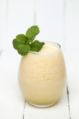 Fresh pineapple juice isolated on a white background.