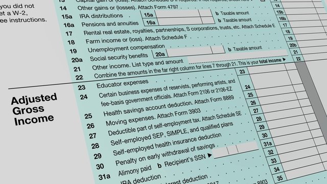 camera panning on a 1040 usa tax form, with automatic fill in of name surname and signature
