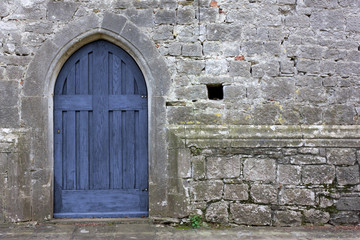 Fototapeta na wymiar Blue Gothic Church Back Door