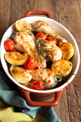 Oven baked chicken legs with vegetables