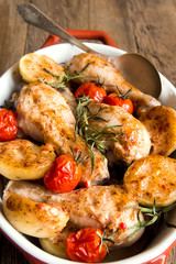 Oven baked chicken legs with vegetables