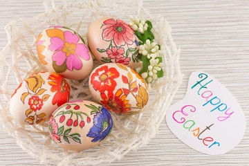 Decorated Easter eggs in a basket