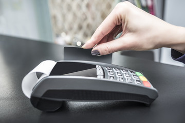 Debit card swiping on pos terminal. 