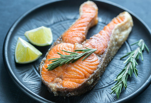 Roasted trout steak with fresh rosemary