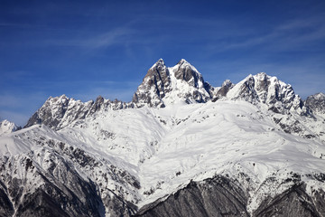 Mount Ushba in winter at sunny day