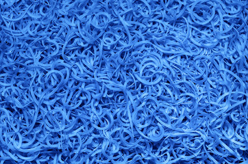 Background of pasta, nasypannyh on the table.